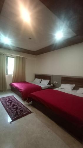 Katil atau katil-katil dalam bilik di Valley Retreat