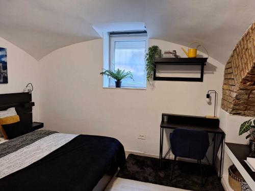 Ένα ή περισσότερα κρεβάτια σε δωμάτιο στο City Pulse