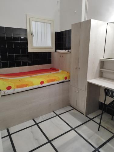 Katil atau katil-katil dalam bilik di Cozy little room