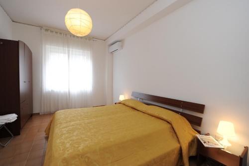 Postel nebo postele na pokoji v ubytování Tizi Apartments Porto