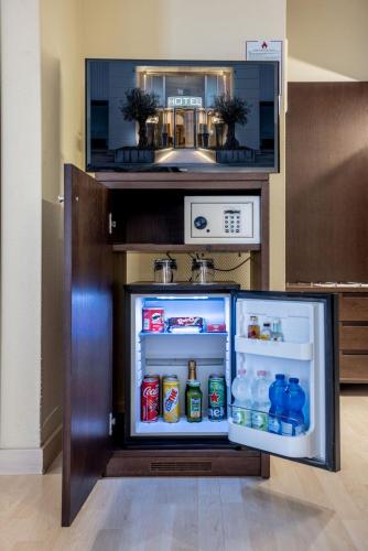 Kuchyň nebo kuchyňský kout v ubytování Stadio Hotel