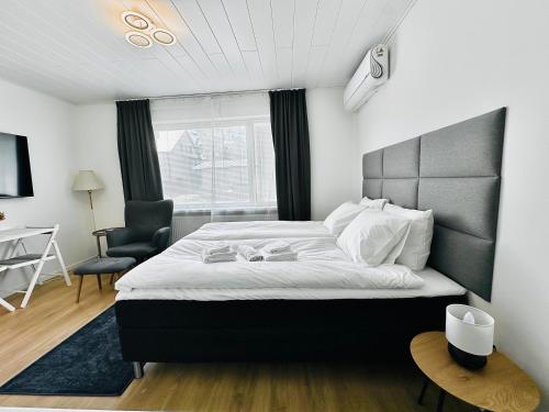 Postel nebo postele na pokoji v ubytování Katariina Apartments