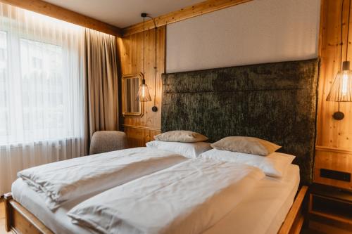 Postel nebo postele na pokoji v ubytování Spa&Aktiv Hotel Lavendel