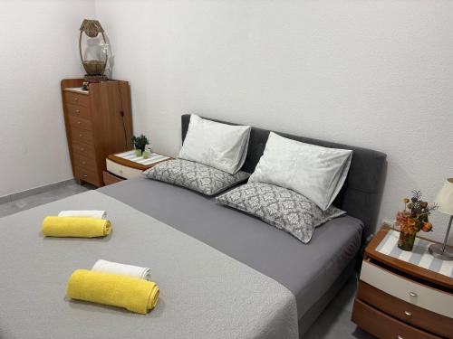Postel nebo postele na pokoji v ubytování Apartman Jasmina