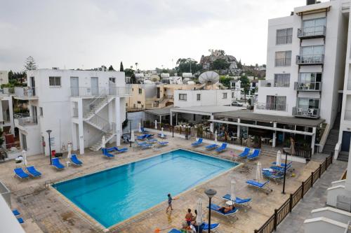 an overhead view of a swimming pool on a building at Sweet Memories STANDARD Apts in Protaras