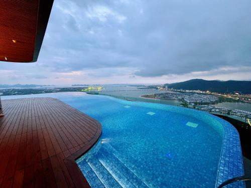 a large swimming pool on top of a building at A La Carte Ha Long Bay Residence by SIMA Chill in Ha Long