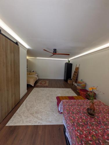 a living room with a couch and a table at Le Daou Sormiou in Marseille