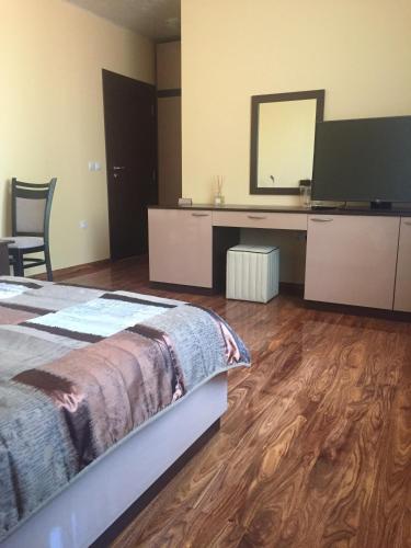 Телевизор и/или развлекательный центр в Hotel Kristal