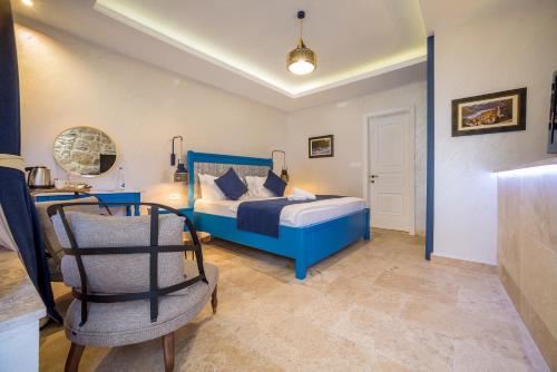Una cama o camas en una habitación de Conte Hotel & Restaurant