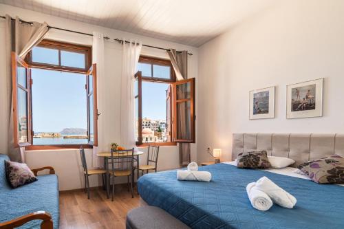 Ένα ή περισσότερα κρεβάτια σε δωμάτιο στο Villa Venezia