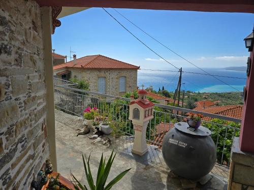 a view of a house from a balcony at The Aegean balcony in Enoría