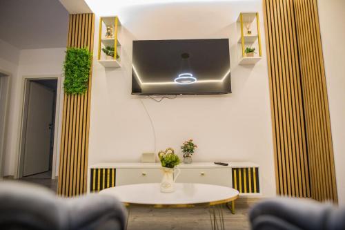 Μια τηλεόραση ή/και κέντρο ψυχαγωγίας στο Apartament Domus Regis
