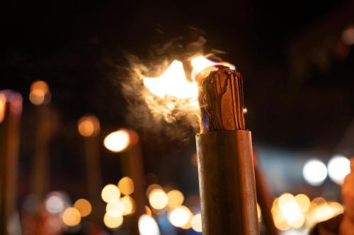 a close up of a lighter with smoke at OR Inn Beipu in Beipu