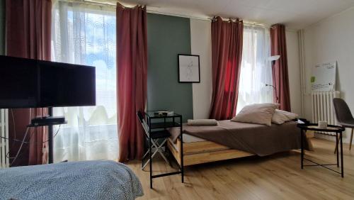 Photo de la galerie de l'établissement Studio spacieux et intimiste Lyon 8 avec Parking Fibre Tram T4, à Lyon