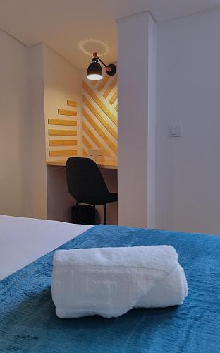 Кровать или кровати в номере Bacalhoeiros 125 Hotel