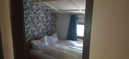 Bed & Breakfast Der Tirolerにあるベッド