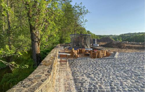 a group of tables and chairs on a stone road at Kaisermantel in Irrhausen