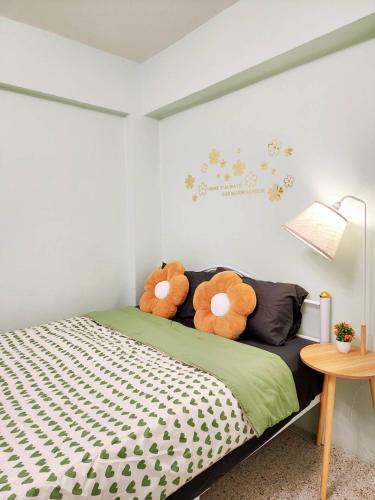 two teddy bears sitting on top of a bed at 804-STP Homely room Free Wi-Fi and Near BTS line in Bangkok