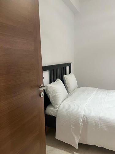 Ένα ή περισσότερα κρεβάτια σε δωμάτιο στο Appartement, en bord de mer