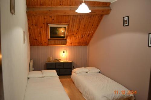 Postel nebo postele na pokoji v ubytování Gîte Le Cabanac