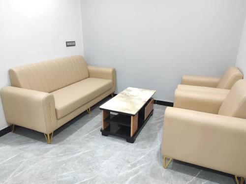Χώρος καθιστικού στο Hotel Pooja Inn Pandharpur