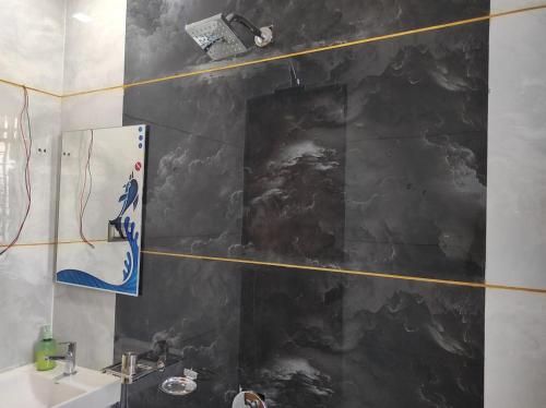 Ένα μπάνιο στο Hotel Pooja Inn Pandharpur