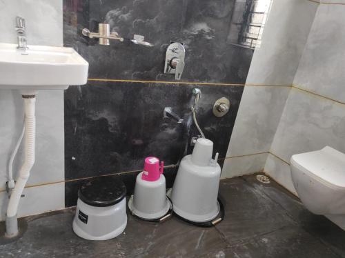 Ένα μπάνιο στο Hotel Pooja Inn Pandharpur