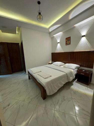 a bedroom with a large bed in a room at King house hotel dahab in Dahab