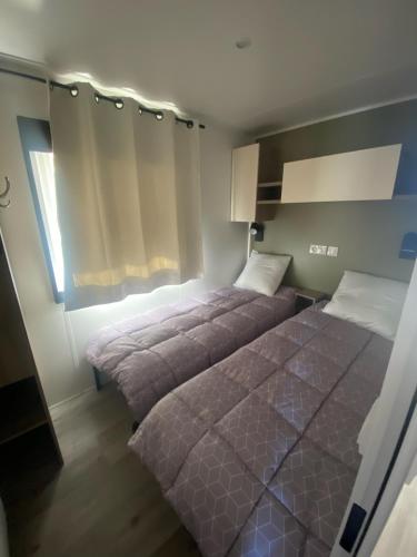 Postel nebo postele na pokoji v ubytování MOBILE HOME FOR YOU