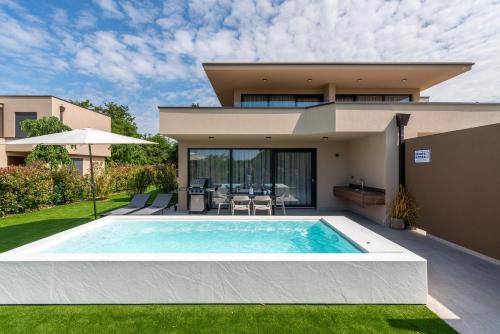 La alberca dentro o cerca de Quercus Village Apartments with private pool