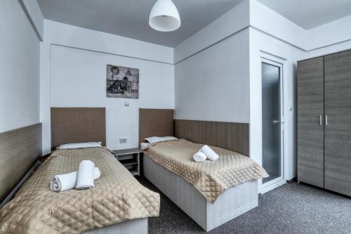 Postel nebo postele na pokoji v ubytování Camere de închiriat Havana Beach