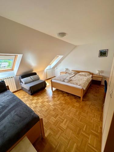 Ένα ή περισσότερα κρεβάτια σε δωμάτιο στο Apartments and Rooms Tajcr