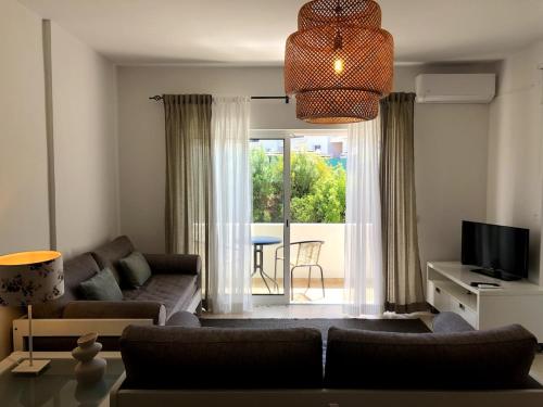 TV a/nebo společenská místnost v ubytování Apt H - Beach Village