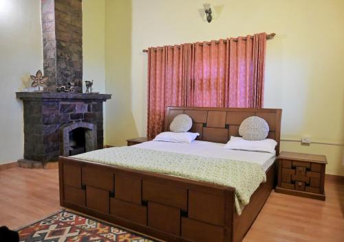 Giường trong phòng chung tại Ekaa Villa