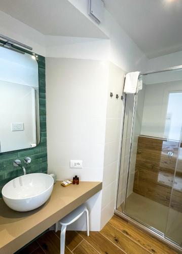a bathroom with a sink and a shower at Villa Casale Ravello Residence in Ravello