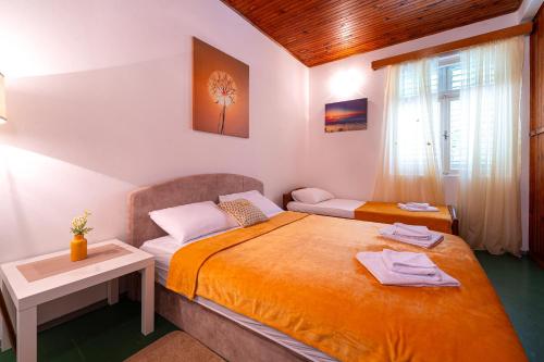 Salty Nest Residenceにあるベッド