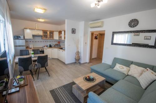 Kuchyň nebo kuchyňský kout v ubytování Apartment Ana