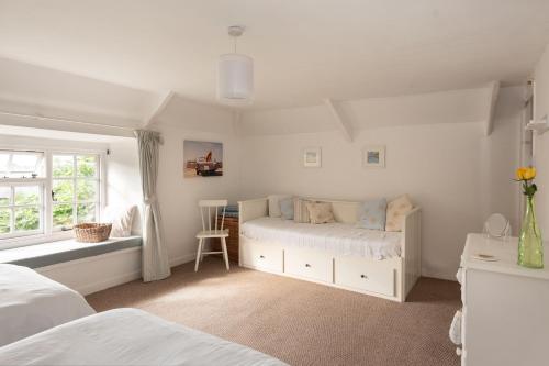 Voodi või voodid majutusasutuse Honeysuckle Cottage toas