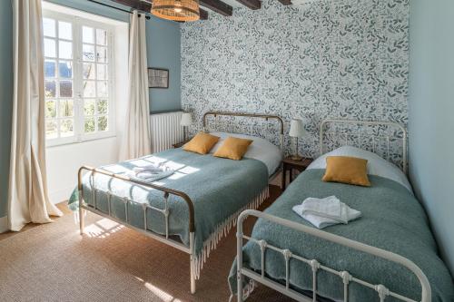 Posteľ alebo postele v izbe v ubytovaní La maison de la tour