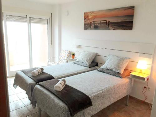 A bed or beds in a room at Agata Views