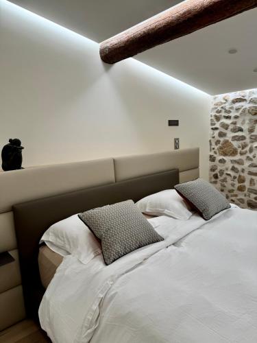 Ein Bett oder Betten in einem Zimmer der Unterkunft Le Palais Aubernon