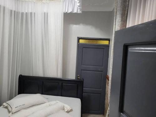 Cama o camas de una habitación en Greena Royal Suites