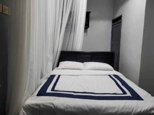 Cama o camas de una habitación en Greena Royal Suites