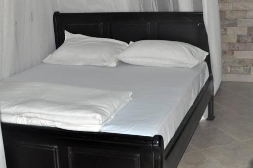 Cama o camas de una habitación en Greena Royal Suites