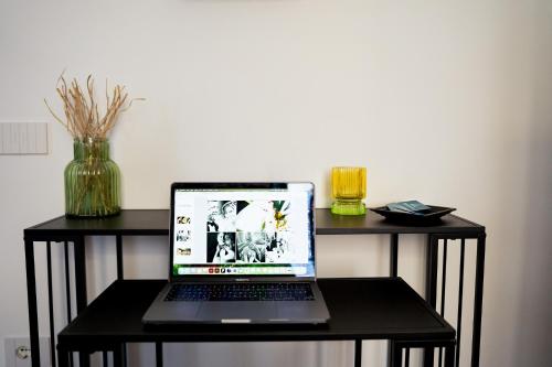 Televisyen dan/atau pusat hiburan di Philomena Home Appartamento Elegante vicino Pompei