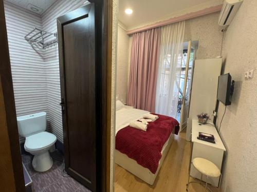 Koupelna v ubytování Cozy Rooms Tbilisi