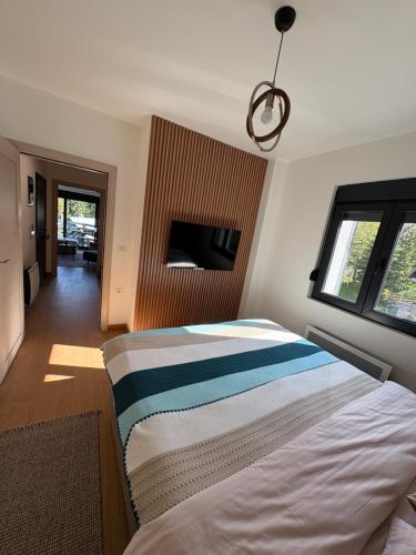 Postel nebo postele na pokoji v ubytování Villa Jezero 3