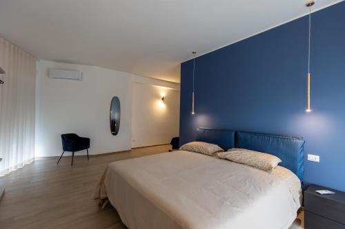 Ένα ή περισσότερα κρεβάτια σε δωμάτιο στο La casa di Libero
