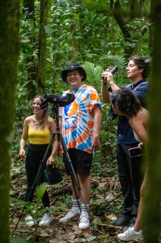 a group of people standing in the woods at Yellow Tree Suites in Fortuna