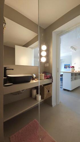 a bathroom with a sink and a mirror at Val Mar in Novi Vinodolski
